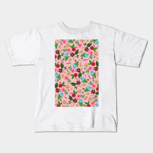 Red, pink, blue and maroon flower pattern with peach color background Kids T-Shirt